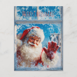 Weihnachtsmann winkt fröhlich aus einem schneebede postkarte