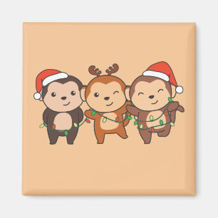 Weihnachtsmänner am Affen Niedliche Affen Ma Magnet