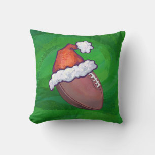 Weihnachtsmannmütze Football auf Grün Kissen