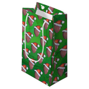 Weihnachtsmannmütze Football auf Grün Kleine Geschenktüte
