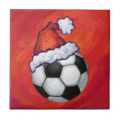 Weihnachtsmannmütze Fußball auf Rot Fliese (Vorderseite)