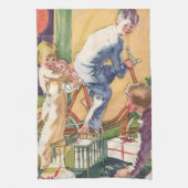 Weihnachtsmorgen, Kinder mit Geschenken Geschirrtuch (Vertikal)