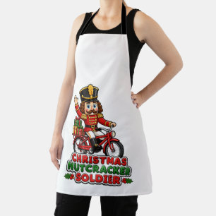 Weihnachtsnussknacker Soldat auf Fahrrad Schürze