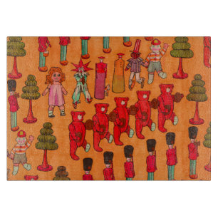 Weihnachtsparade mit Vintage-Spielzeug 1907 Puck-M Schneidebrett