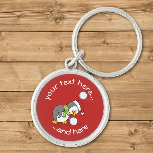 Weihnachtspenguin Erlangen eines Schneeballganges  Schlüsselanhänger