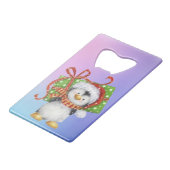Weihnachtspenguin mit Geschenk - Feiertag Deko Geldbeutel Flaschenöffner (Vorderseite Schrägansicht)