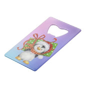 Weihnachtspenguin mit Geschenk - Feiertag Deko Geldbeutel Flaschenöffner (Rückseite Schrägansicht)