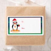 Weihnachtspenguin mit Weihnachtsmannmütze und Sonn (Insitu)