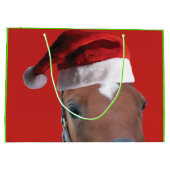 Weihnachtspferd mit einem Weihnachtshut Große Geschenktüte (Rückseite)