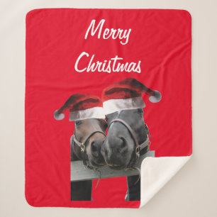 Weihnachtspferde in Santa Claus Hats Sherpadecke