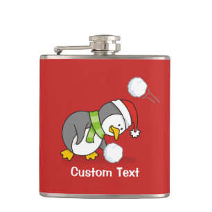 Weihnachtspinguin bekommt eine Schneeball Flachmann