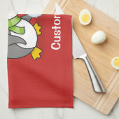 Weihnachtspinguin bekommt eine Schneeball Geschirrtuch (Viertel Falte)