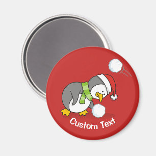 Weihnachtspinguin bekommt eine Schneeball Magnet