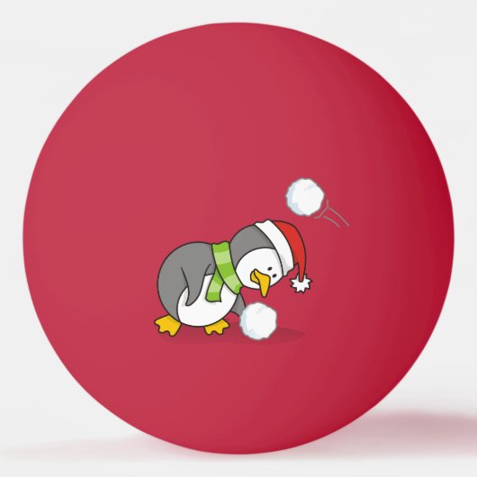 Weihnachtspinguin bekommt eine Schneeball Tischtennisball (Vorderseite)