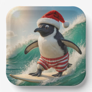 Weihnachtspinguin, der auf einer Meereswelle surft Pappteller