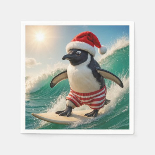 Weihnachtspinguin, der auf einer Meereswelle surft Serviette (Vorderseite)