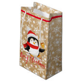 Weihnachtspinguin mit Glocke auf Papiertüte ausseh Kleine Geschenktüte (Rückseite Schrägansicht)