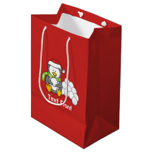Weihnachtspinguin sitzend mit Schneebälle Mittlere Geschenktüte