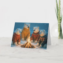 Weihnachtspolarebären um ein Lagerfeuer