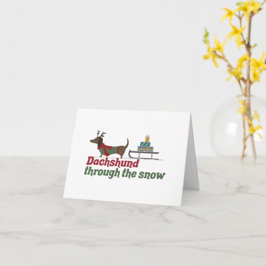 Weihnachtspuppe: Dackel durch den Schnee Karte (Gelbe Blume)