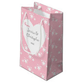 Weihnachtsrosa mit weißen Sternen Kleine Geschenktüte (Rückseite Schrägansicht)