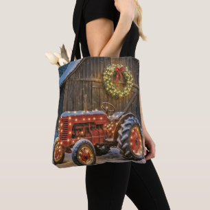 Weihnachtsroter Bauernhof-Traktor mit leuchtendem  Tasche
