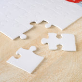 Weihnachtsroter Lieferwagen-LKW auf einer Puzzle (Seite)