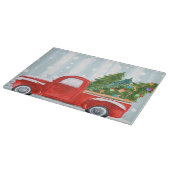 Weihnachtsroter Lieferwagen-LKW auf einer Schneidebrett (Ecke)