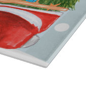 Weihnachtsroter Lieferwagen-LKW auf einer Schneidebrett (Ecke)