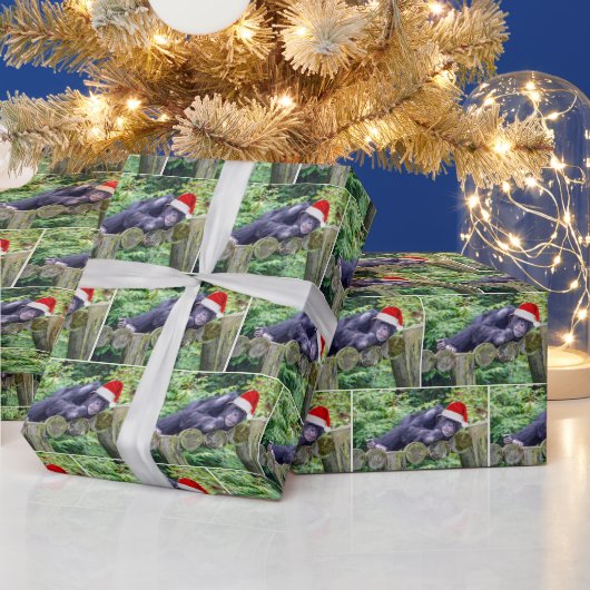 Weihnachtsschimpanse mit Weihnachtsmannmütze Geschenkpapier (Feiertage)