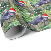 Weihnachtsschimpanse mit Weihnachtsmannmütze Geschenkpapier (Rolleneckpunkt)
