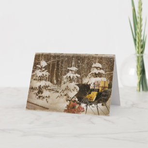 Weihnachtsschlitten mit Geschenken im Winterwald Feiertagskarte