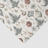 Weihnachtsschmuck auf Creme Seidenpapier (Ausschnitt)