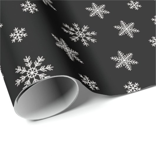 Weihnachtsschneeflocken auf schwarzem Hintergrund Geschenkpapier (Rolleneckpunkt)