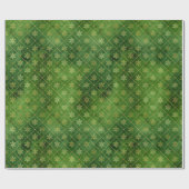 Weihnachtsschneeflocken aus Gold auf Green Geschenkpapier (Flach)