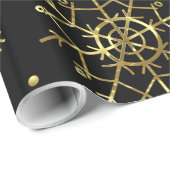 Weihnachtsschneeflocken aus Gold auf schwarz Geschenkpapier (Rolleneckpunkt)