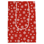 Weihnachtsschneeflocken rot-weiß Geschenktasche Mittlere Geschenktüte (Rückseite)