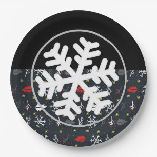Weihnachtsschneeflocken und Blätter mit schwarzer Pappteller