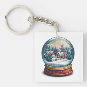 Weihnachtsschneekugel mit winziger Dorfgestaltung Schlüsselanhänger