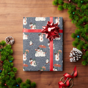 Weihnachtsschneemann-Familie im Vintage-Stil mit m Geschenkpapier