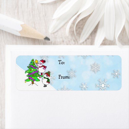 Weihnachtsschneemänner dekorieren Baum zu und von (Insitu)