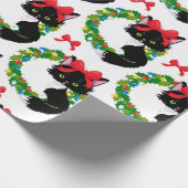 Weihnachtsschwarze Katze mit rotem Bogen Geschenkpapier (Ecke)