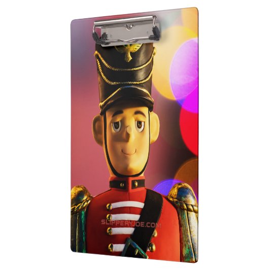 Weihnachtsspielsoldat Figur SlipperyJoe Gay pri Klemmbrett (Links)