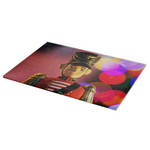 Weihnachtsspielsoldat Figur SlipperyJoe Gay pri Schneidebrett