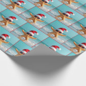 Weihnachtsstarfisch im Ozean Geschenkpapier (Ecke)