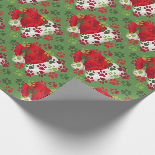 Weihnachtstatzen-Drucke mit Weihnachtsmannmütze Geschenkpapier (Ecke)