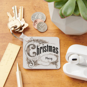 Weihnachtstext im Vintage-Stil mit verzierter Umra Schlüsselanhänger