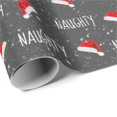 Weihnachtstext mit Weihnachtsmannmützen Geschenkpapier (Rolleneckpunkt)