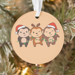 Weihnachtstiere der Affen Niedliche Affen oder Ornament