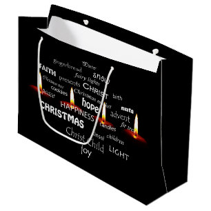 Weihnachtstypografie mit Kerzenlicht Große Geschenktüte